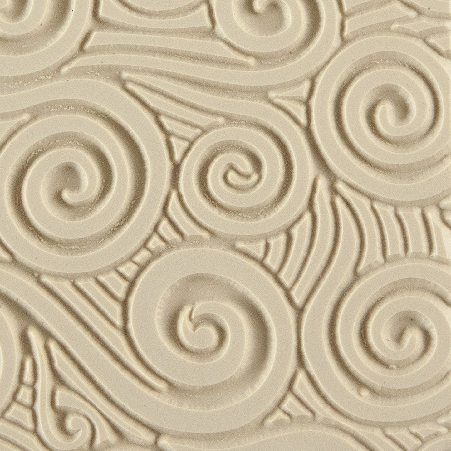 Texture Tile - Blundering Winds. Beige Texture Tiles are flexible, washable and can be used with any soft clay. Spritz with CoolSlip or dust on Dry Powder Release for stick-free impressions when using metal clay and polymer clay.