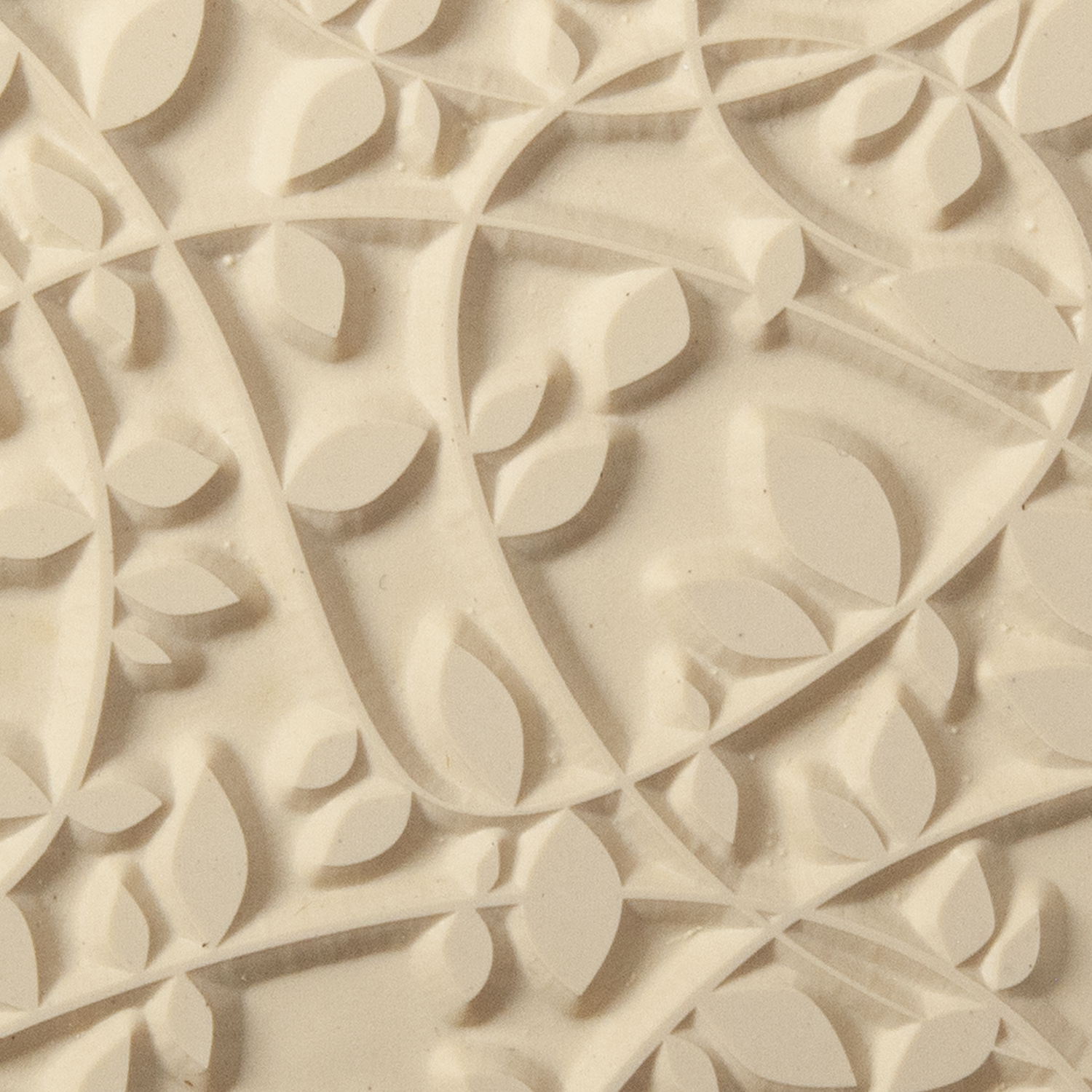Texture Tile - Over Growth. Beige Texture Tiles are flexible, washable and can be used with any soft clay. Spritz with CoolSlip or dust on Dry Powder Release for stick-free impressions when using metal clay and polymer clay.