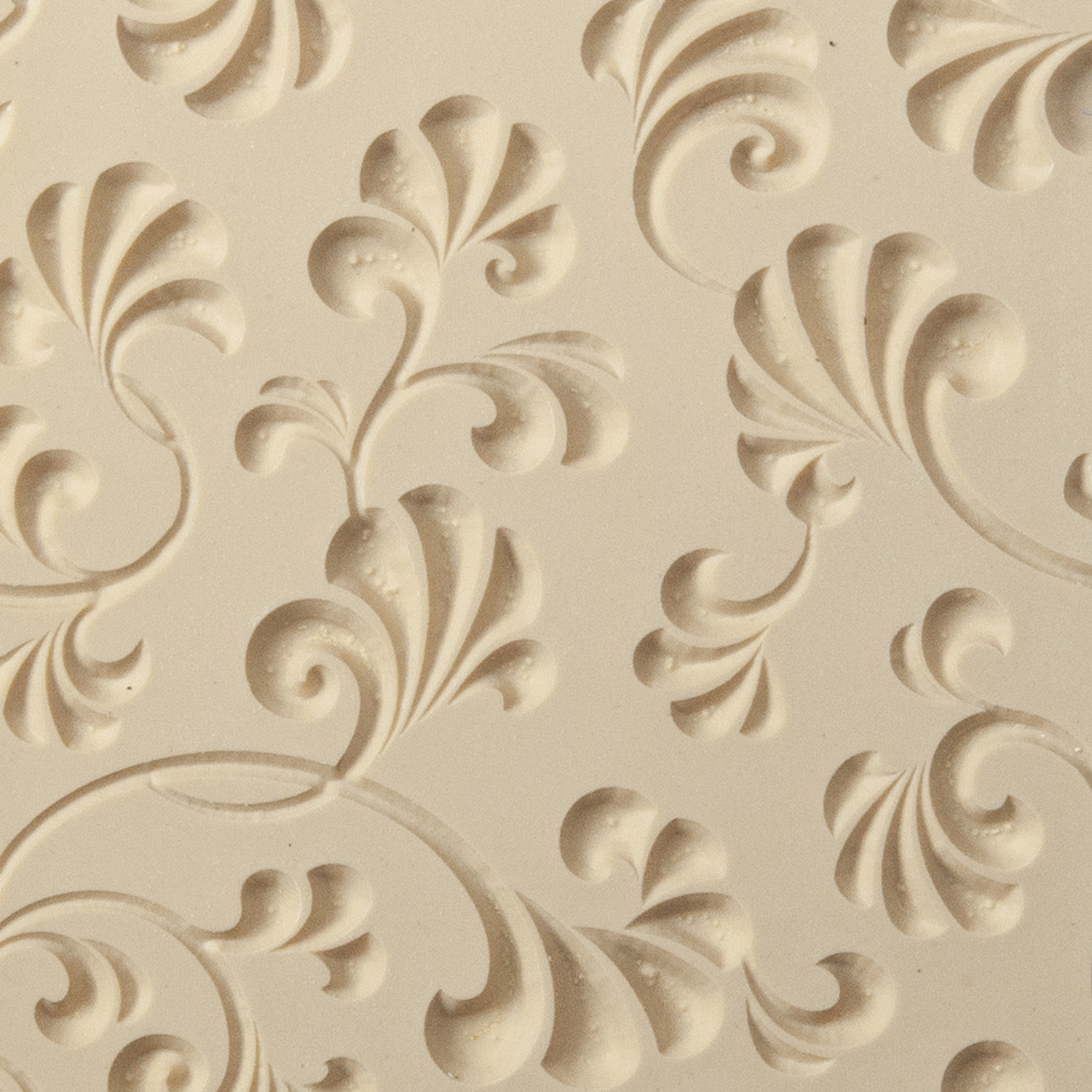 Texture Tile - Plume Party Embossed. Beige Texture Tiles are flexible, washable and can be used with any soft clay. Spritz with CoolSlip or dust on Dry Powder Release for stick-free impressions when using metal clay and polymer clay.