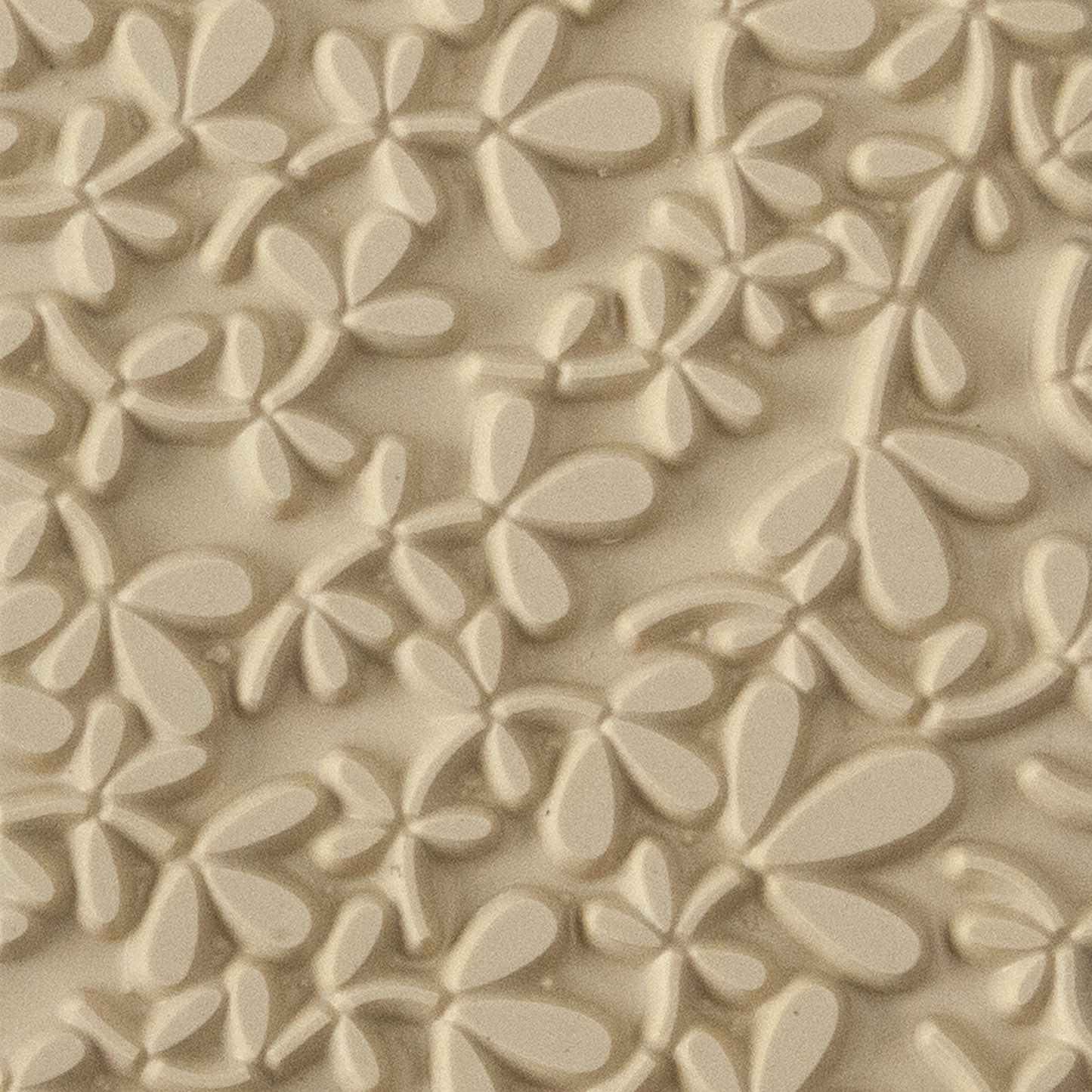 Texture Tile - Leafy Vine. Beige Texture Tiles are flexible, washable and can be used with any soft clay. Spritz with CoolSlip or dust on Dry Powder Release for stick-free impressions when using metal clay and polymer clay.