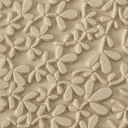 Texture Tile - Leafy Vine. Beige Texture Tiles are flexible, washable and can be used with any soft clay. Spritz with CoolSlip or dust on Dry Powder Release for stick-free impressions when using metal clay and polymer clay.