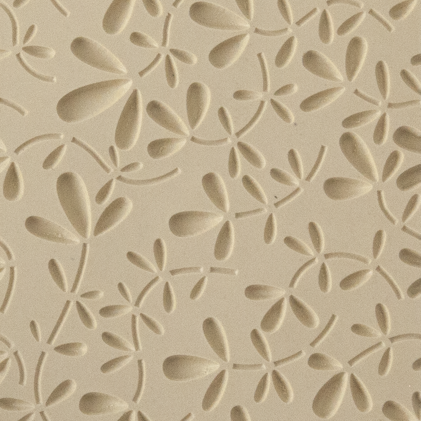 Texture Tile - Leafy Vine Embossed. Beige Texture Tiles are flexible, washable and can be used with any soft clay. Spritz with CoolSlip or dust on Dry Powder Release for stick-free impressions when using metal clay and polymer clay.