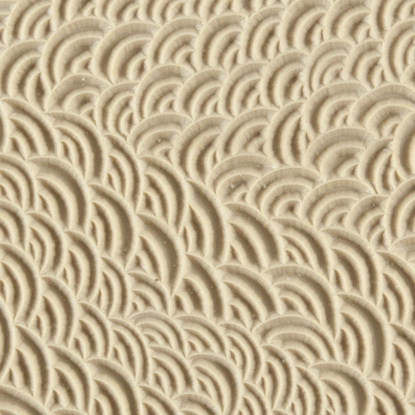Texture Tile - Scaled. Beige Texture Tiles are flexible, washable and can be used with any soft clay. Spritz with CoolSlip or dust on Dry Powder Release for stick-free impressions when using metal clay and polymer clay.