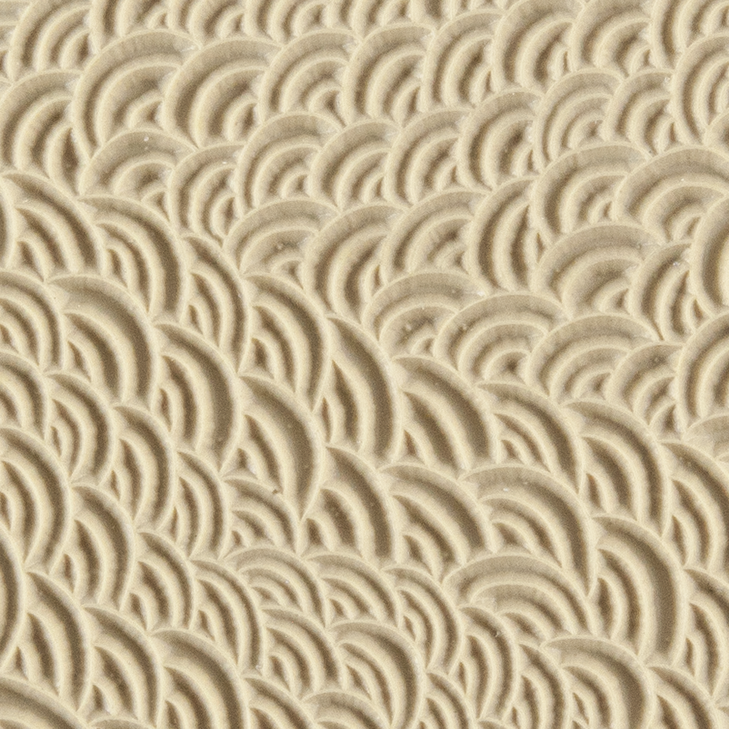 Texture Tile - Scaled. Beige Texture Tiles are flexible, washable and can be used with any soft clay. Spritz with CoolSlip or dust on Dry Powder Release for stick-free impressions when using metal clay and polymer clay.