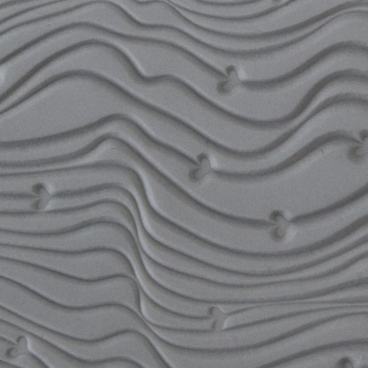 Texture Tile - Hearts on the Line sample rolled into clay