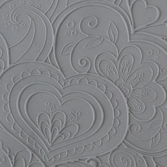 Texture Tile - Blooming Hearts Fineline sample rolled into clay