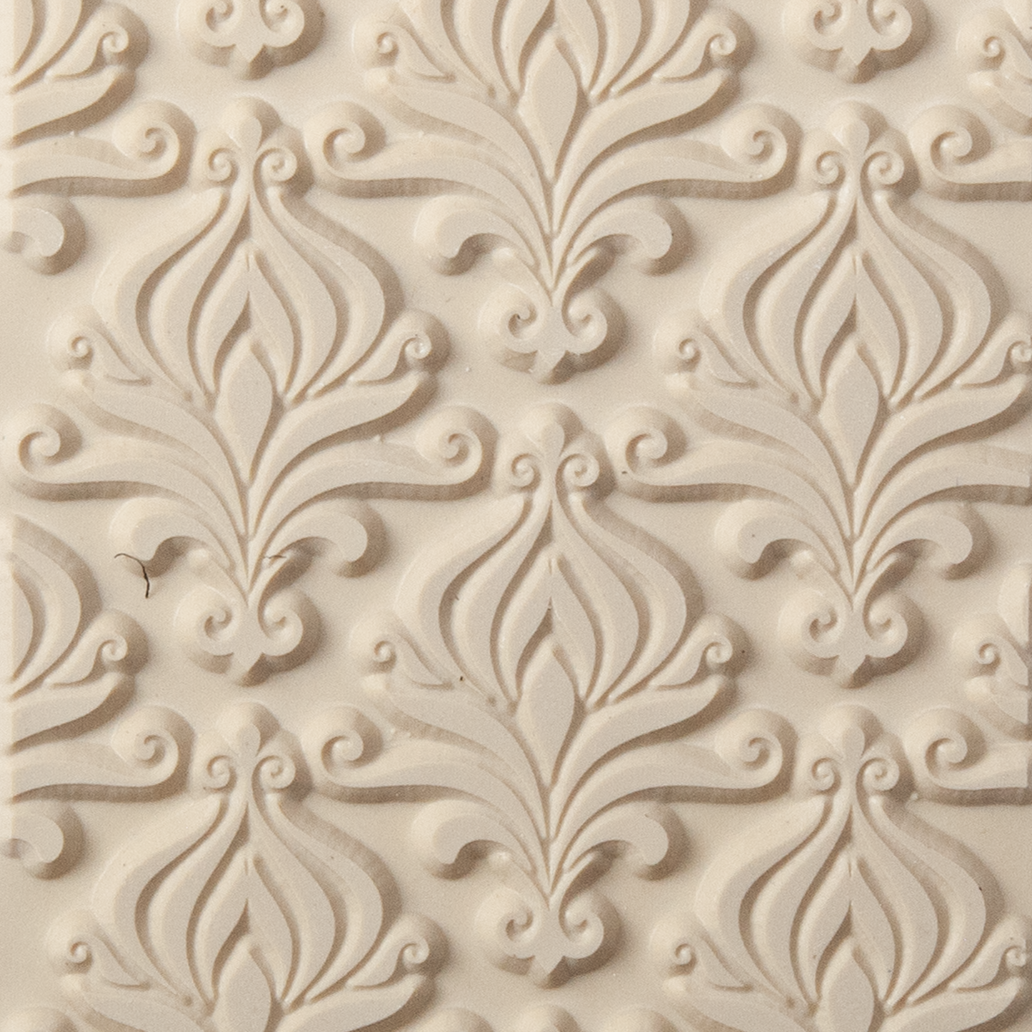 Texture Tile - Blooming Onion. Beige Texture Tiles are flexible, washable and can be used with any soft clay. Spritz with CoolSlip or dust on Dry Powder Release for stick-free impressions when using metal clay and polymer clay.