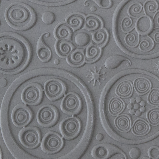 Texture Tile - Astro Embossed sample rolled into clay