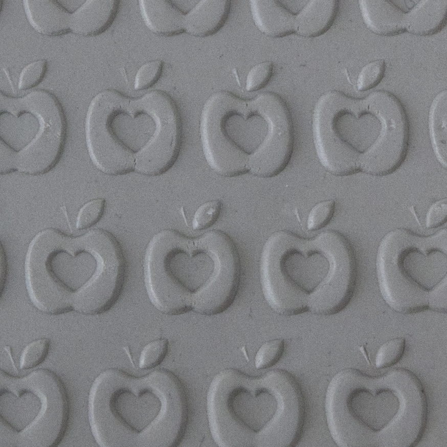 Texture Tile - The Heart is the Core Embossed sample rolled into clay