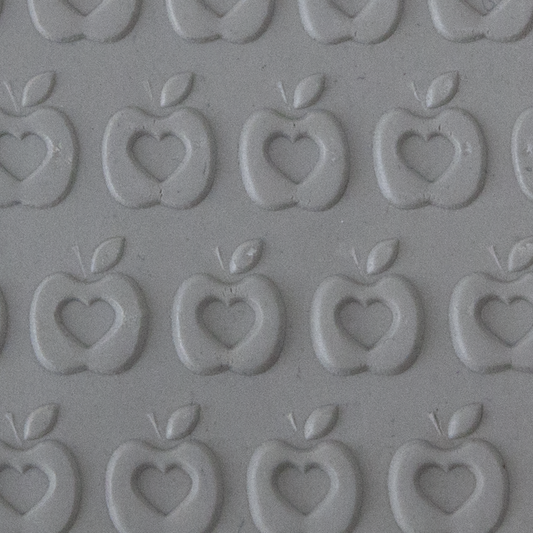 Texture Tile - The Heart is the Core Embossed sample rolled into clay