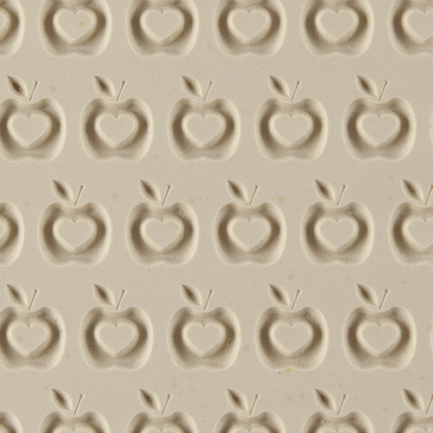 Texture Tile - The Heart is the Core Embossed. Beige Texture Tiles are flexible, washable and can be used with any soft clay. Spritz with CoolSlip or dust on Dry Powder Release for stick-free impressions when using metal clay and polymer clay.