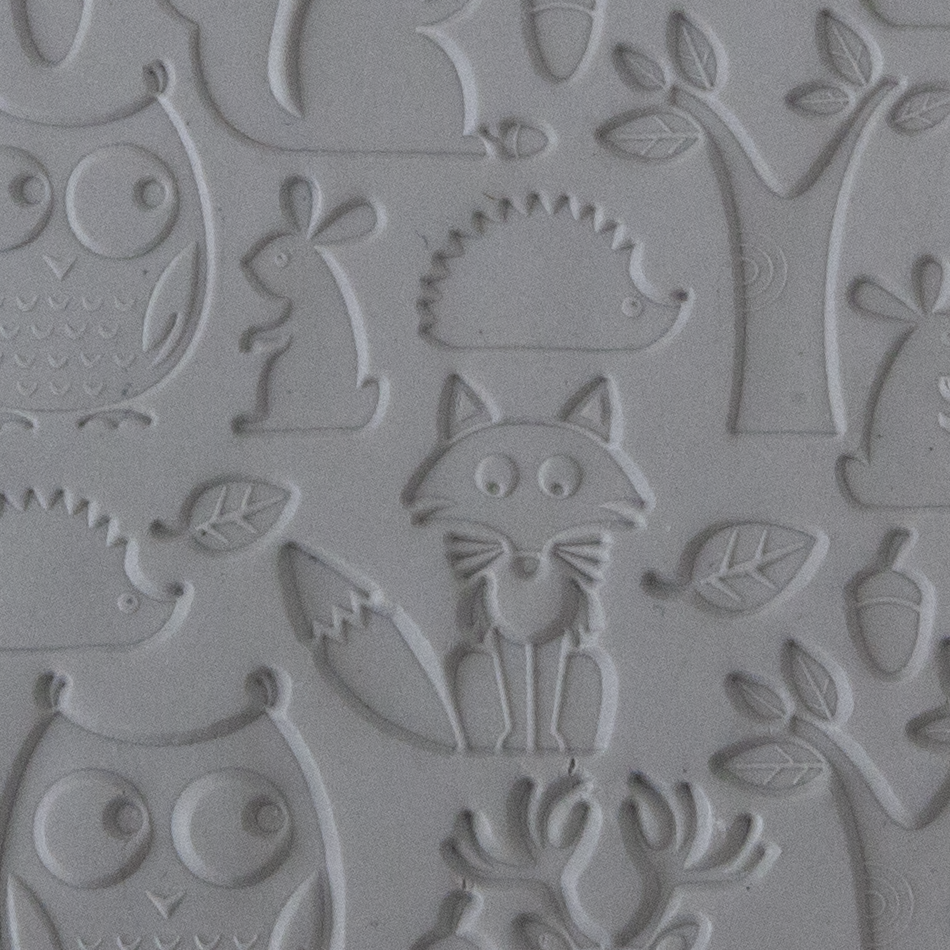Texture Tile - Woodland Residents sample rolled into clay