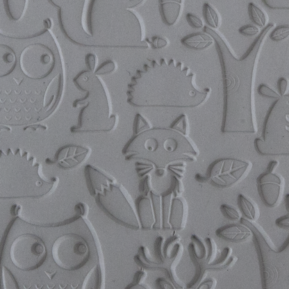 Texture Tile - Woodland Residents sample rolled into clay
