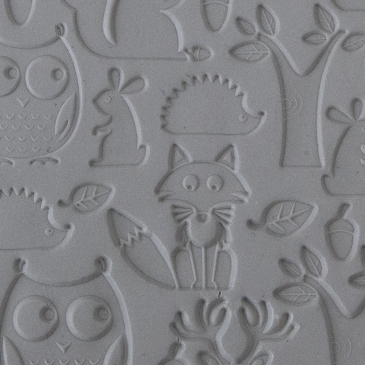 Texture Tile - Woodland Residents sample rolled into clay