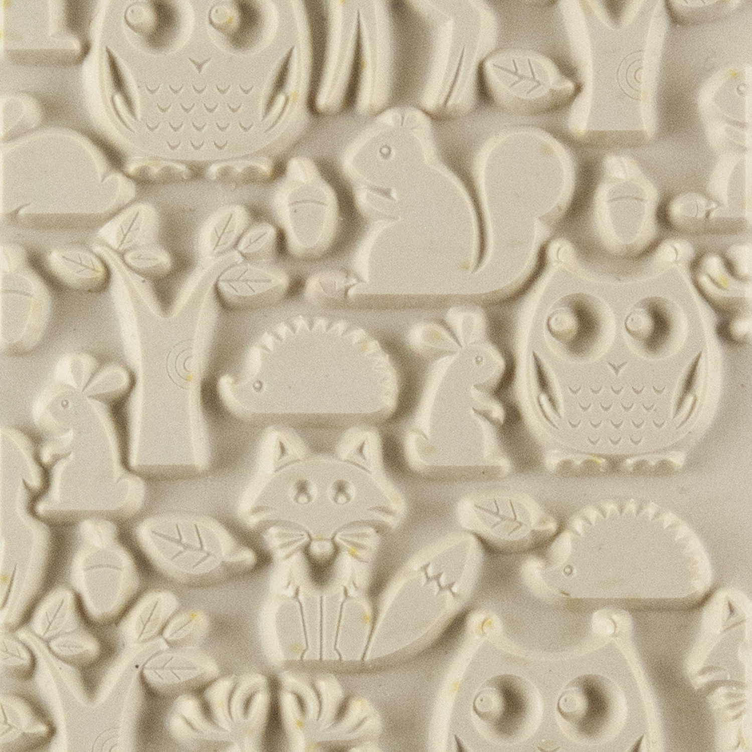 Texture Tile - Woodland Residents. Beige Texture Tiles are flexible, washable and can be used with any soft clay. Spritz with CoolSlip or dust on Dry Powder Release for stick-free impressions when using metal clay and polymer clay.