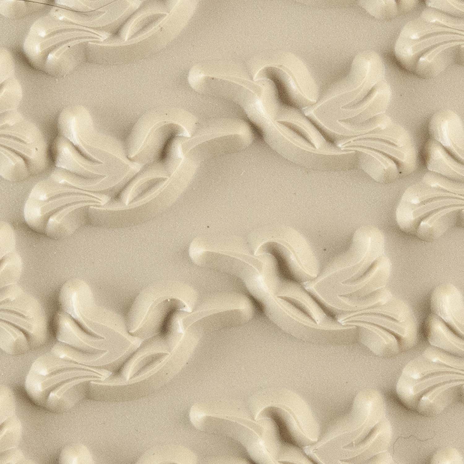 Texture Tile - Humming Around. Beige Texture Tiles are flexible, washable and can be used with any soft clay. Spritz with CoolSlip or dust on Dry Powder Release for stick-free impressions when using metal clay and polymer clay.