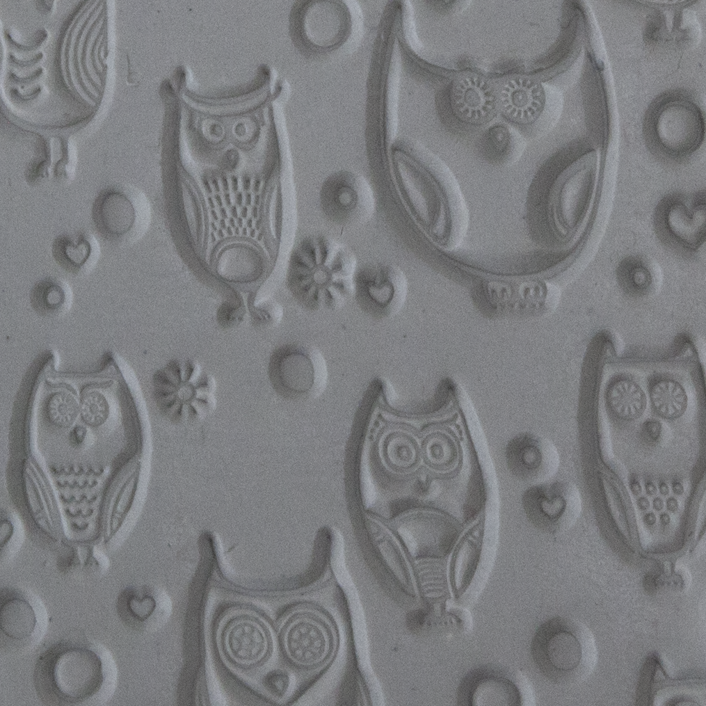 Texture Tile - Whose Hoo sample rolled into clay