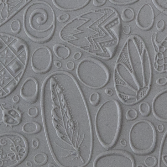 Texture Tile - Pebble Puzzle Fineline sample rolled into clay