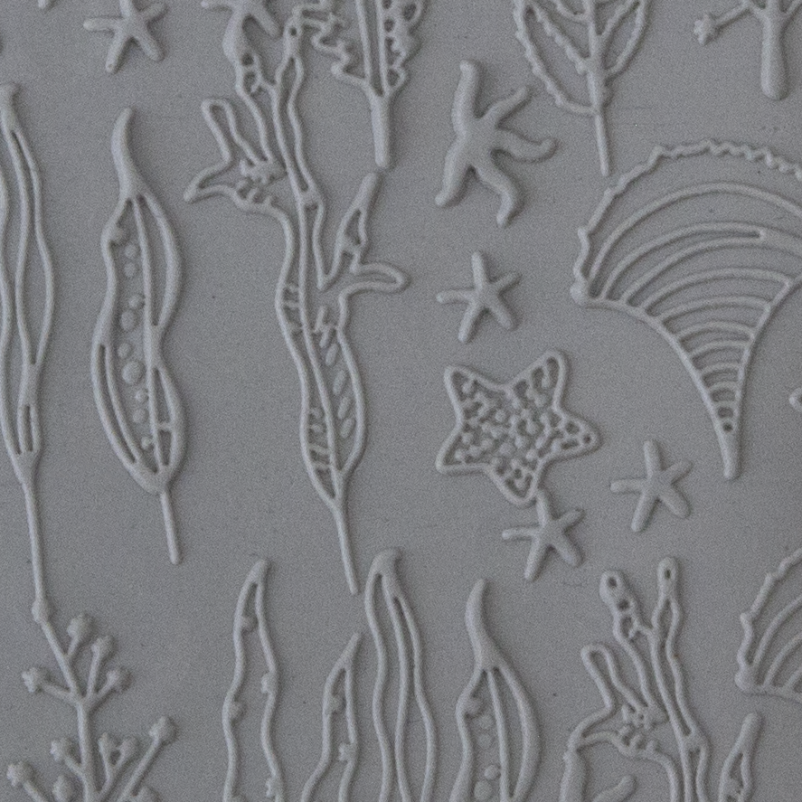 Texture Tile - Seascape Fineline sample rolled into clay