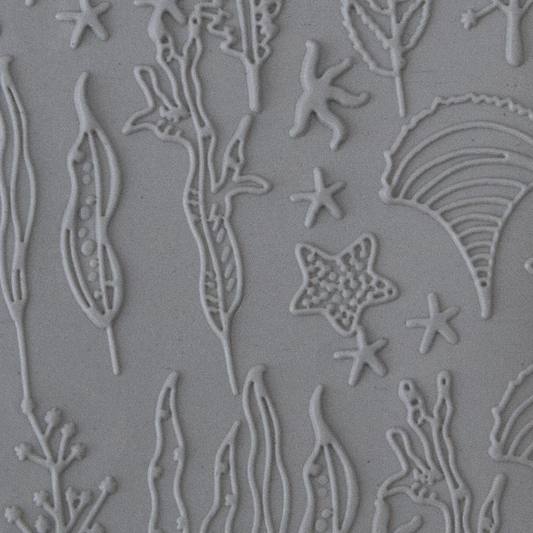 Texture Tile - Seascape Fineline sample rolled into clay