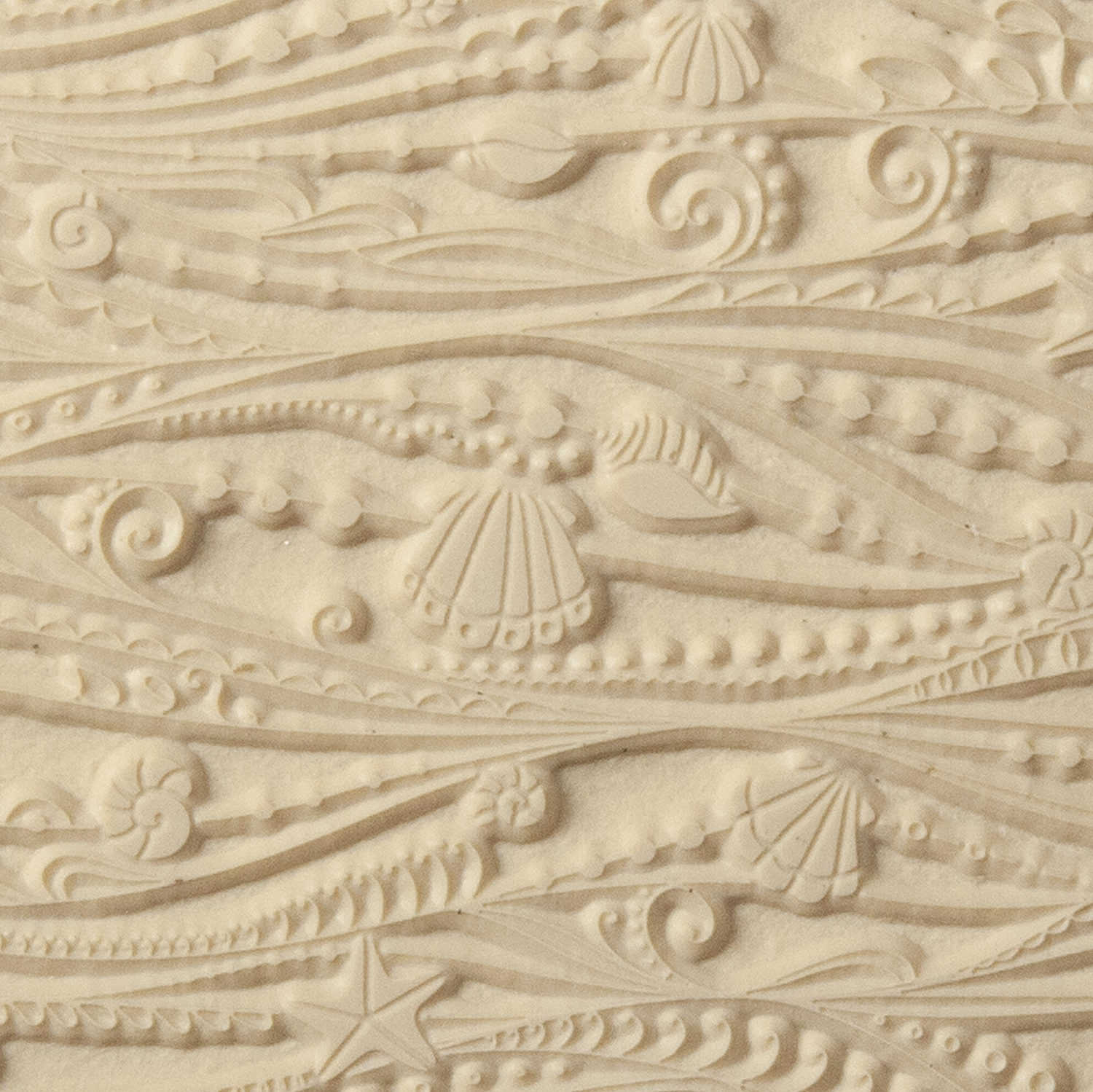 Texture Tile - Ocean Motion. Beige Texture Tiles are flexible, washable and can be used with any soft clay. Spritz with CoolSlip or dust on Dry Powder Release for stick-free impressions when using metal clay and polymer clay.