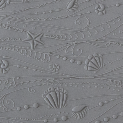 Texture Tile - Ocean Motion Fineline sample rolled into clay