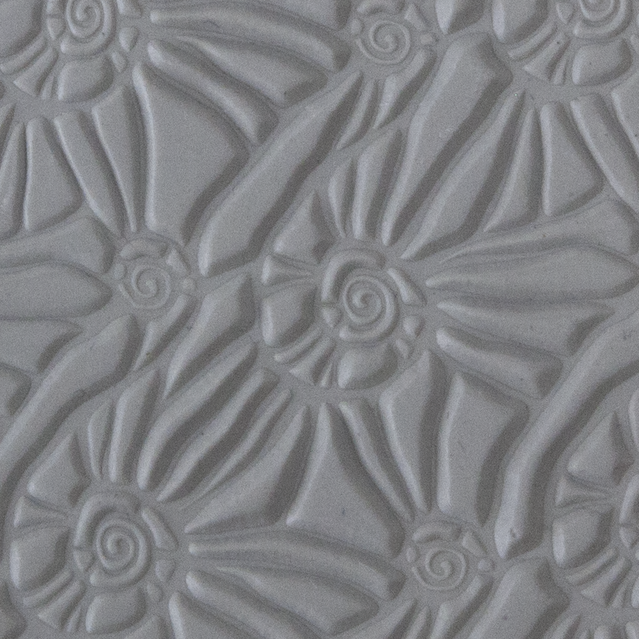 Texture Tile - Snail Parade sample rolled into clay