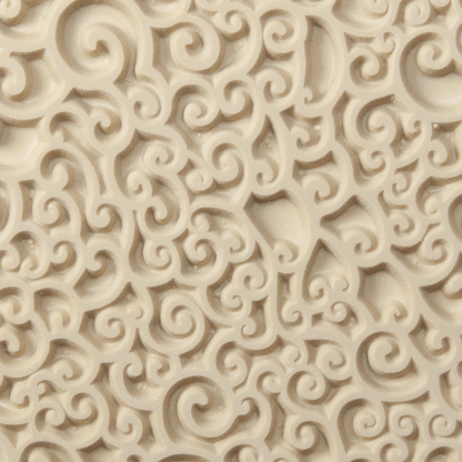 Texture Tile - Sea Foam. Beige Texture Tiles are flexible, washable and can be used with any soft clay. Spritz with CoolSlip or dust on Dry Powder Release for stick-free impressions when using metal clay and polymer clay.