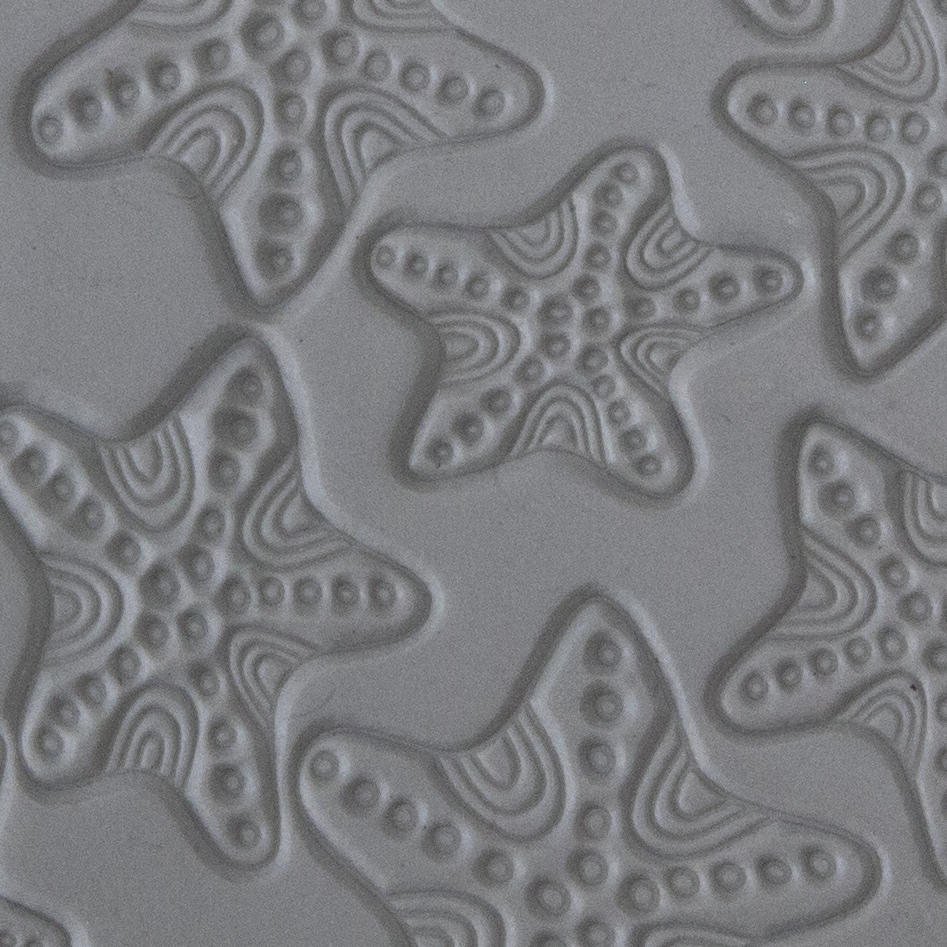 Texture Tile - Jeweled Starfish sample rolled into clay