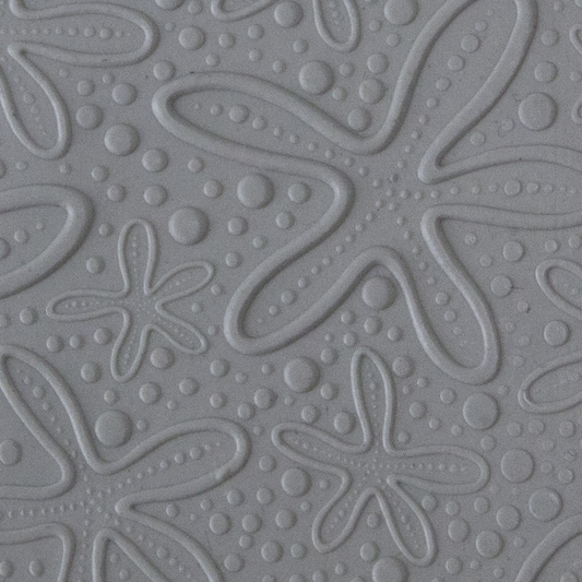 Texture Tile - Cosmic Starfish Embossed sample rolled into clay