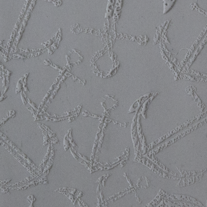 Texture Tile - Anchors Away Fineline sample rolled into clay