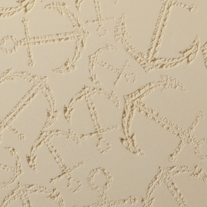 Texture Tile - Anchors Away Fineline. Beige Texture Tiles are flexible, washable and can be used with any soft clay. Spritz with CoolSlip or dust on Dry Powder Release for stick-free impressions when using metal clay and polymer clay.