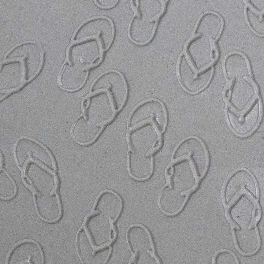 Texture Tile - The Flips and the Flops Embossed sample rolled into clay