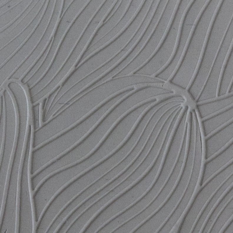 Texture Tile - Sea Current Embossed sample rolled into clay