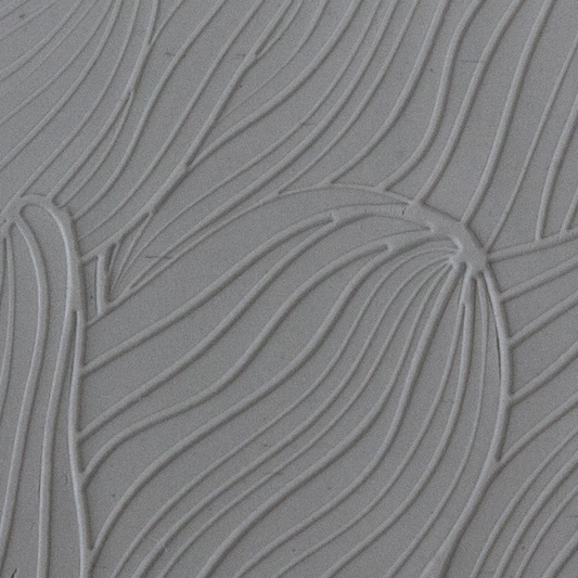 Texture Tile - Sea Current Embossed sample rolled into clay