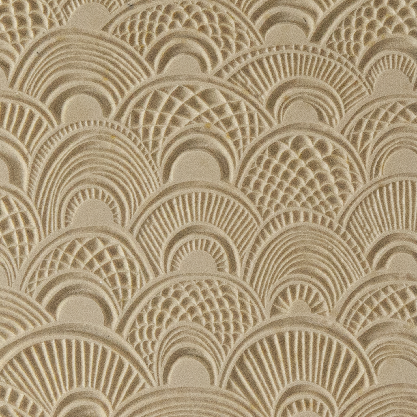 Texture Tile - Seashell Sunrise. Beige Texture Tiles are flexible, washable and can be used with any soft clay. Spritz with CoolSlip or dust on Dry Powder Release for stick-free impressions when using metal clay and polymer clay.