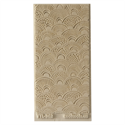 Texture Tile - Seashell Sunrise. Beige Texture Tiles are flexible, washable and can be used with any soft clay. Spritz with CoolSlip or dust on Dry Powder Release for stick-free impressions when using metal clay and polymer clay.