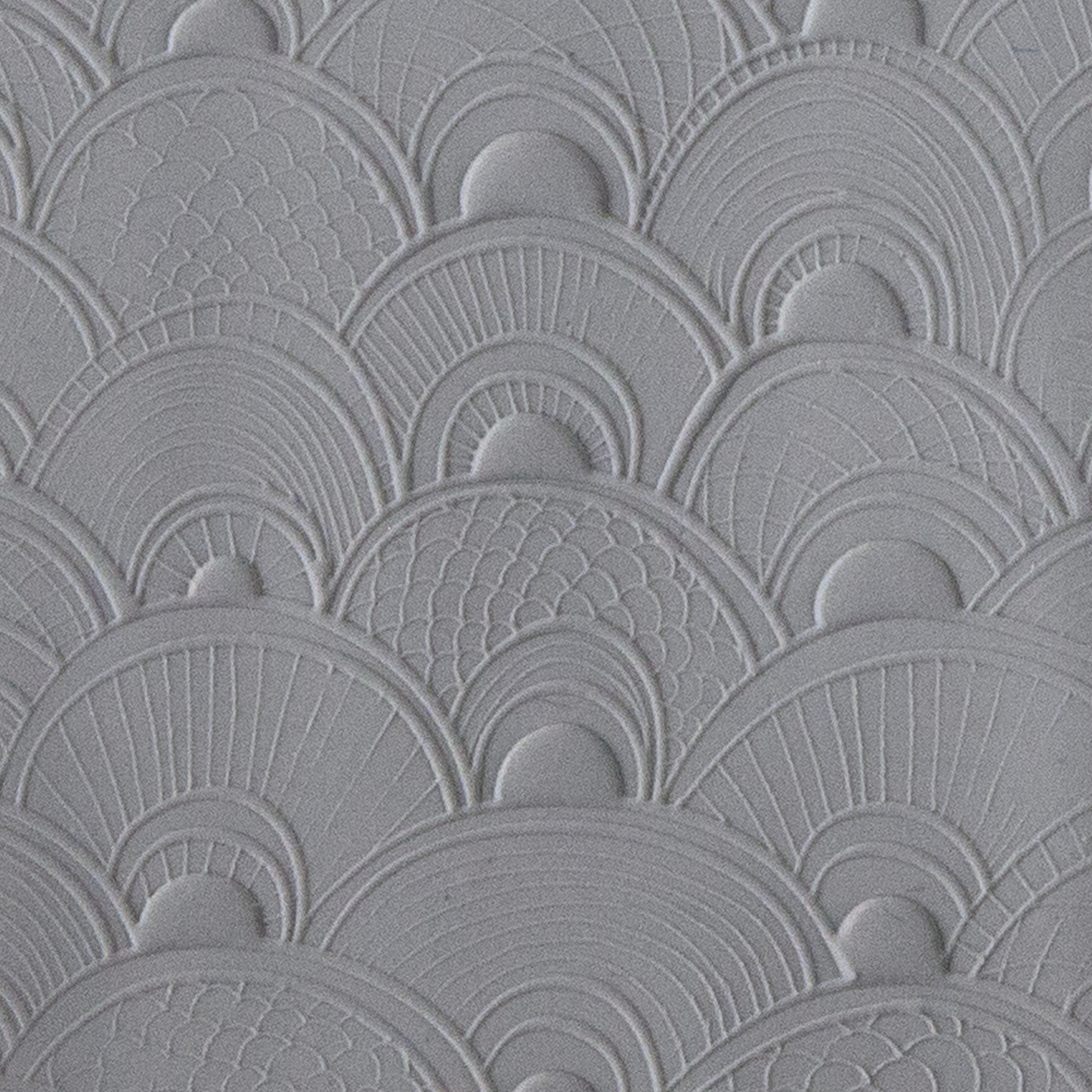 Texture Tile - Seashell Sunrise Embossed sample rolled into clay