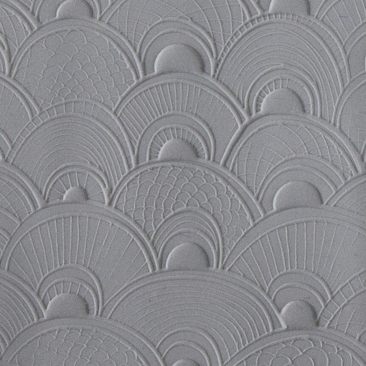 Texture Tile - Seashell Sunrise Embossed sample rolled into clay