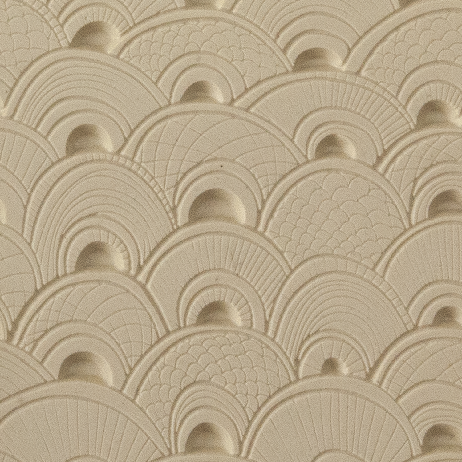 Texture Tile - Seashell Sunrise Embossed. Beige Texture Tiles are flexible, washable and can be used with any soft clay. Spritz with CoolSlip or dust on Dry Powder Release for stick-free impressions when using metal clay and polymer clay.