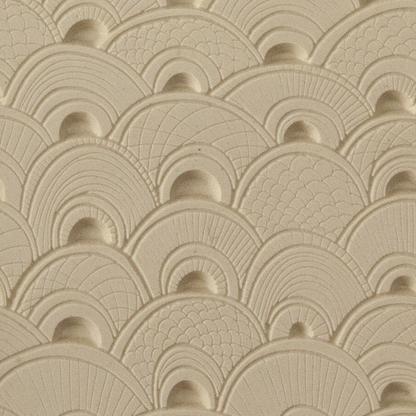 Texture Tile - Seashell Sunrise Embossed. Beige Texture Tiles are flexible, washable and can be used with any soft clay. Spritz with CoolSlip or dust on Dry Powder Release for stick-free impressions when using metal clay and polymer clay.