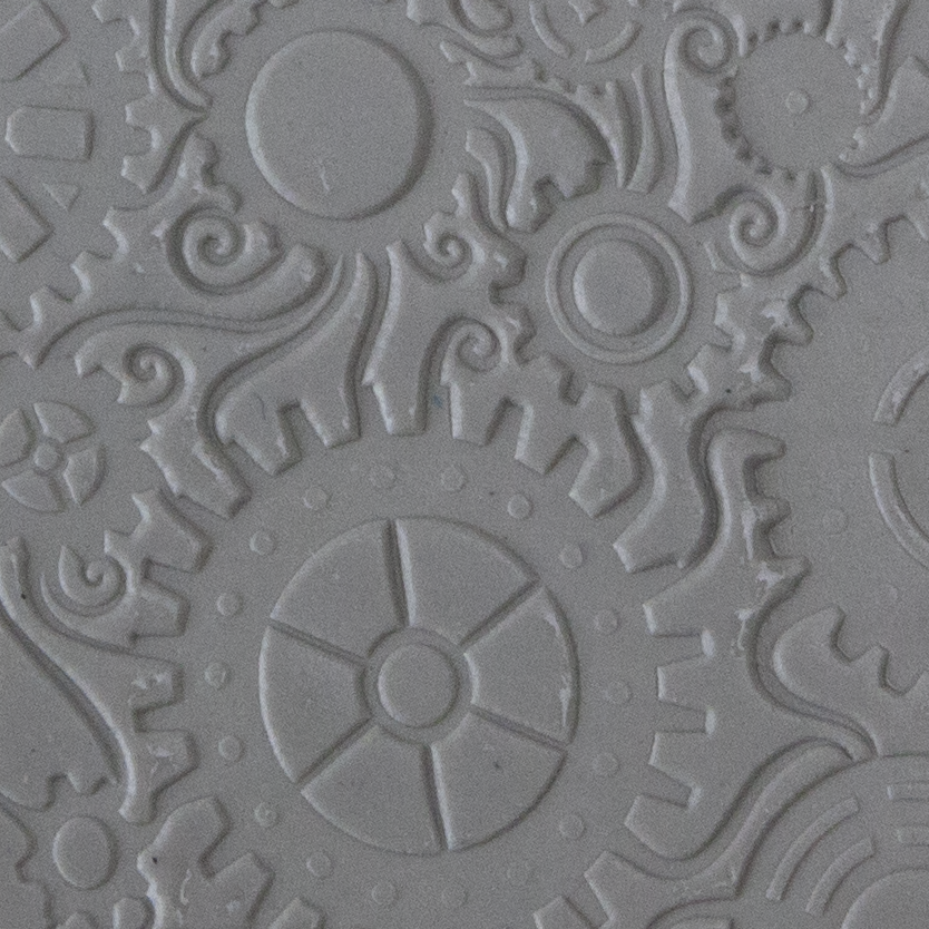 Texture Tile - Steampunk Swirl sample rolled into clay