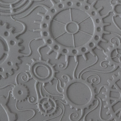 Texture Tile - Steampunk Swirl Embossed sample rolled into clay