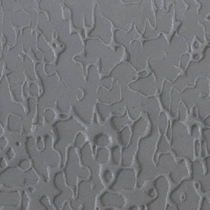 Texture Tile - Dark Water sample rolled into clay