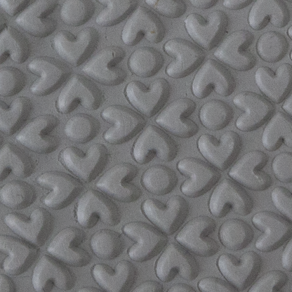 Texture Tile - Lucky Hearts Embossed sample rolled into clay