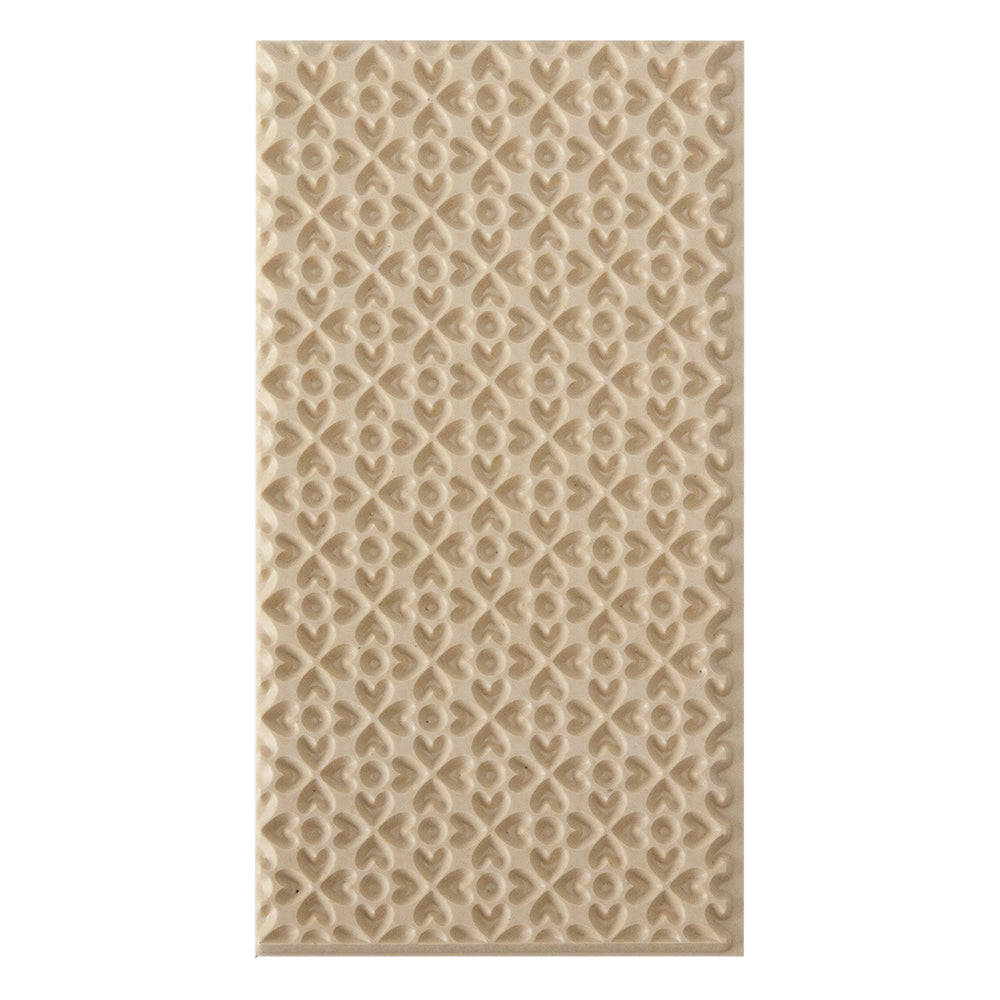 Texture Tile - Lucky Hearts Embossed. Texture Tiles are flexible, washable and can be used with any soft clay. Spritz with CoolSlip or dust on Dry Powder Release for stick-free impressions when using metal clay and polymer clay.