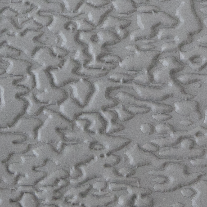 Texture Tile - Dark Water Embossed sample rolled into clay