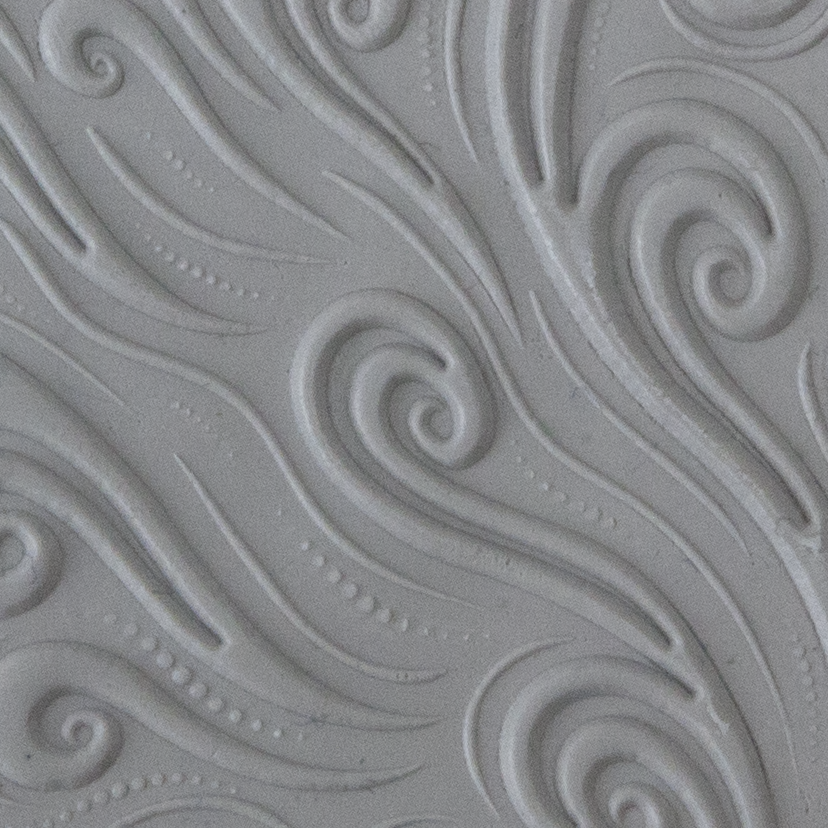 Texture Tile - Whimsical Wind Embossed sample rolled into clay