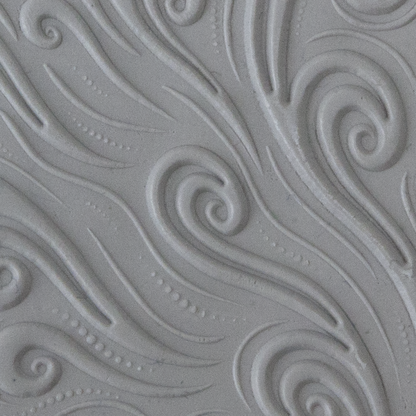 Texture Tile - Whimsical Wind Embossed sample rolled into clay