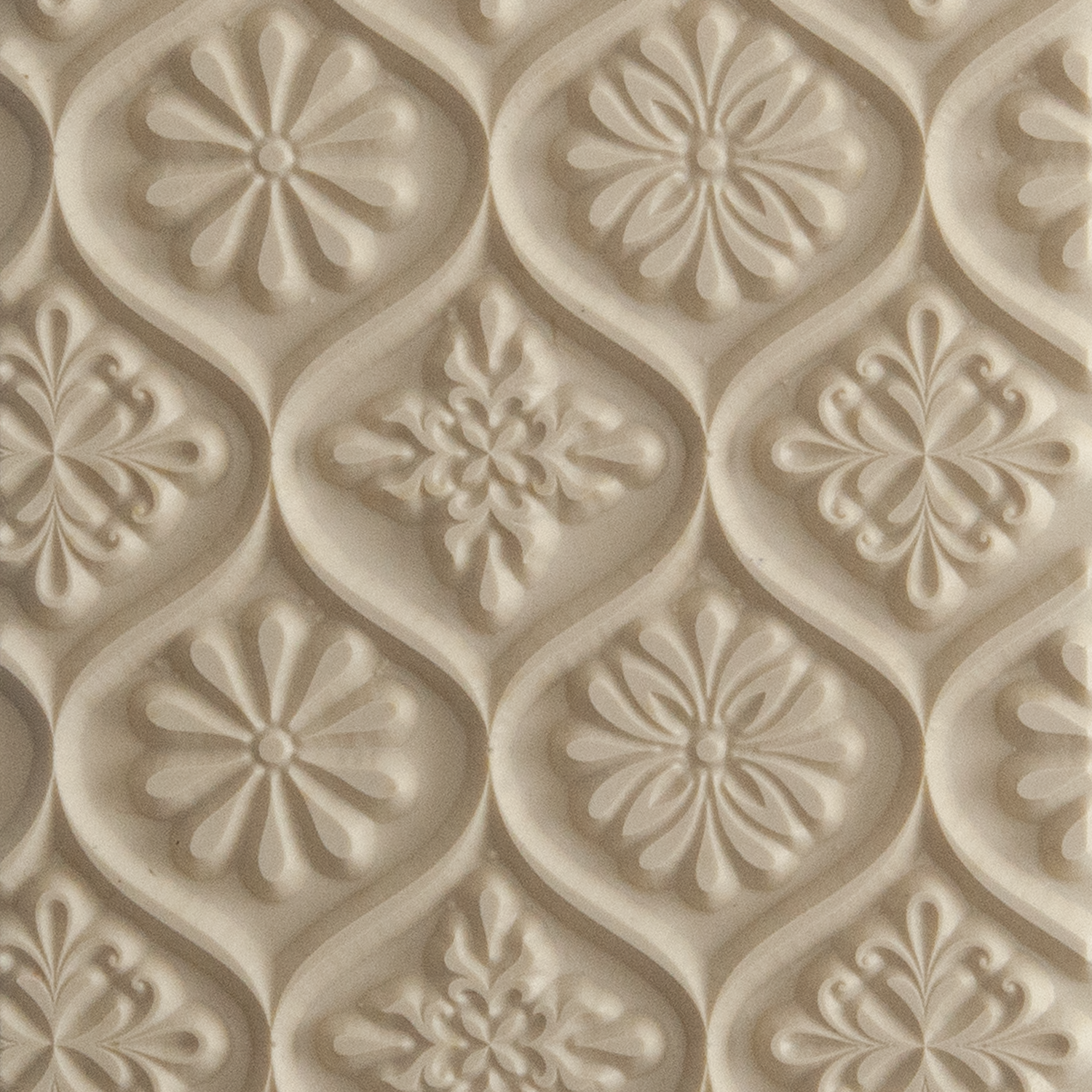 Texture Tile - Woven Daisies. Beige Texture Tiles are flexible, washable and can be used with any soft clay. Spritz with CoolSlip or dust on Dry Powder Release for stick-free impressions when using metal clay and polymer clay.